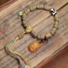 Tibetan beef bone carving Buddha bone string holding tiger tooth dzi beads